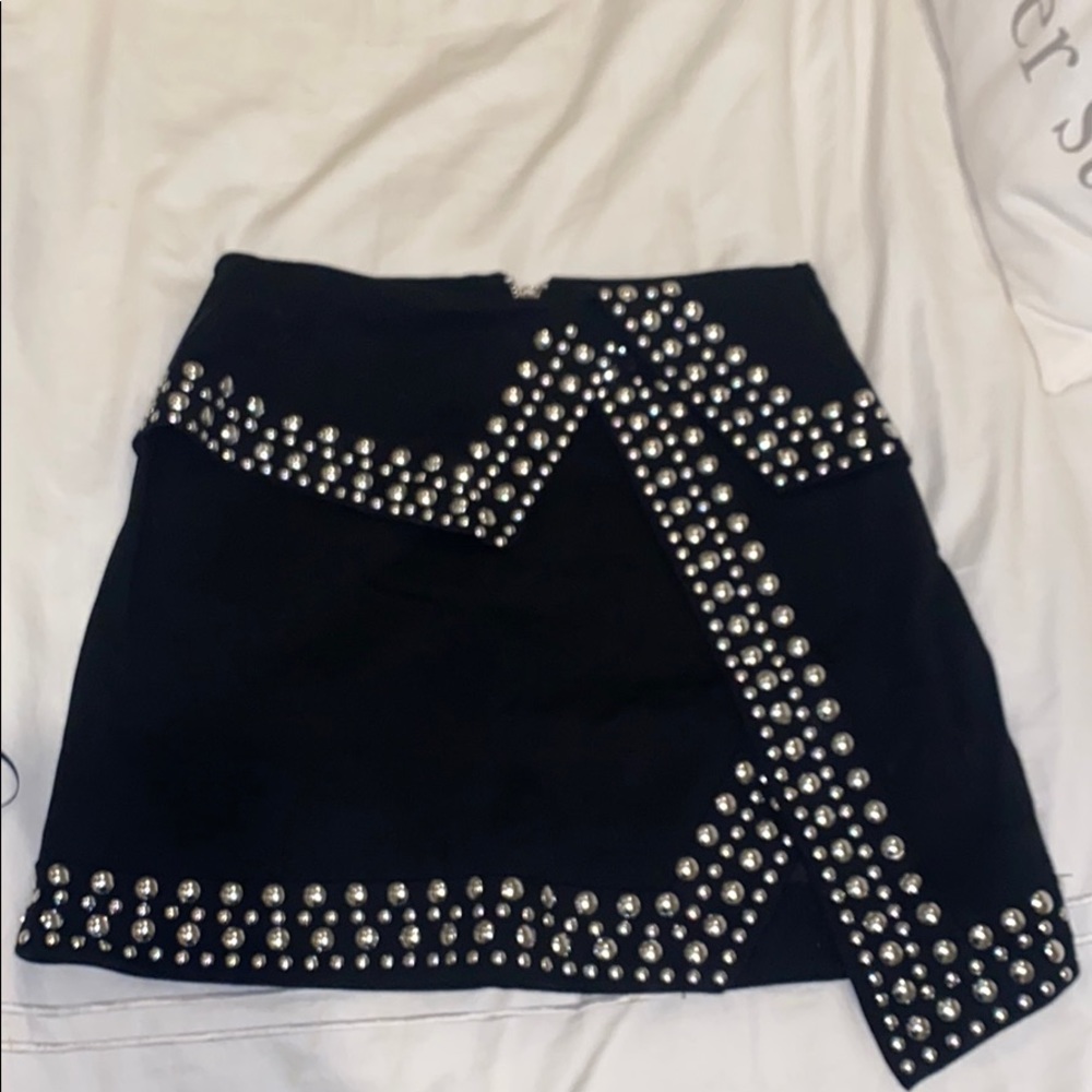 Studded a-symmetric mini skirt